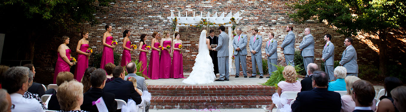 Multiple people standing at the altar for a wedding ceremony